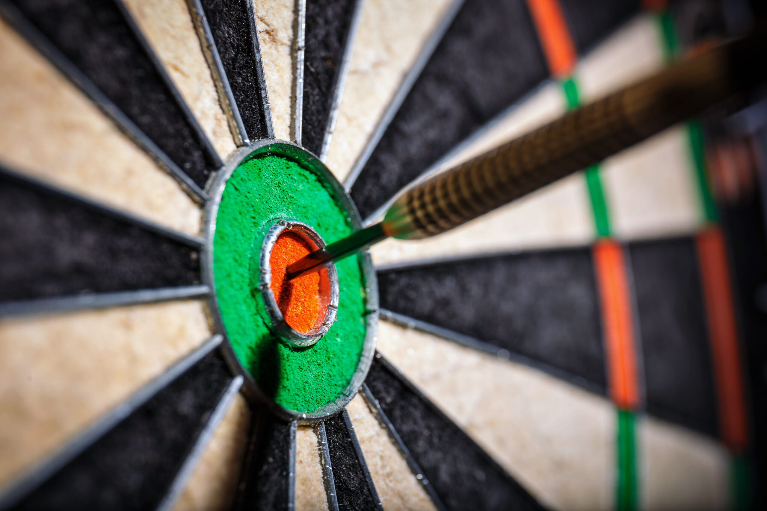 the darts in bull’s eye, close up
